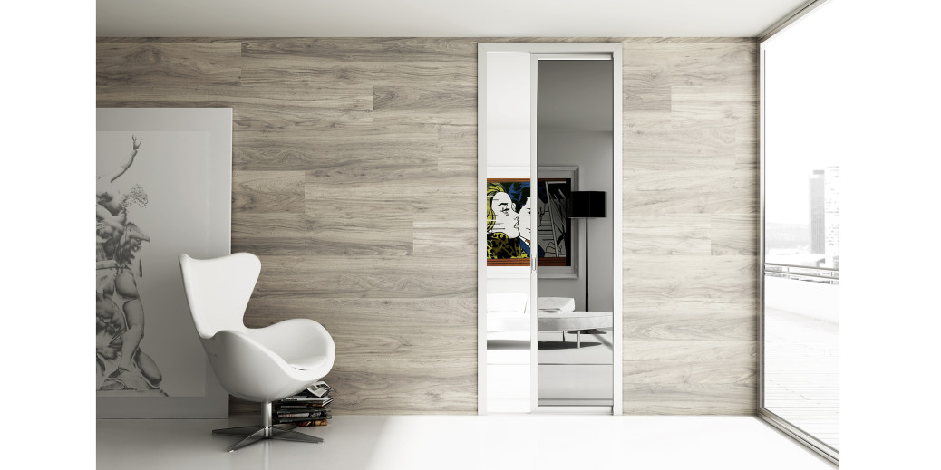 Porte scorrevoli su binario. economiche, personalizzabili. Porta scorrevole vetro fumè